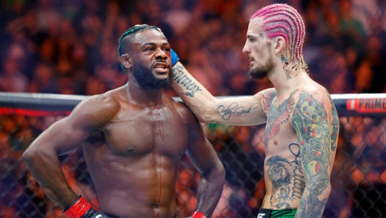 Sean O'Malley consoles Aljamain Sterling after their UFC 292 Bantamweight title mixed martial arts fight.