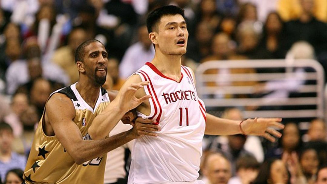 Yao Ming of the Houston Rockets battles for position in the low post in an NBA game in December 2006.