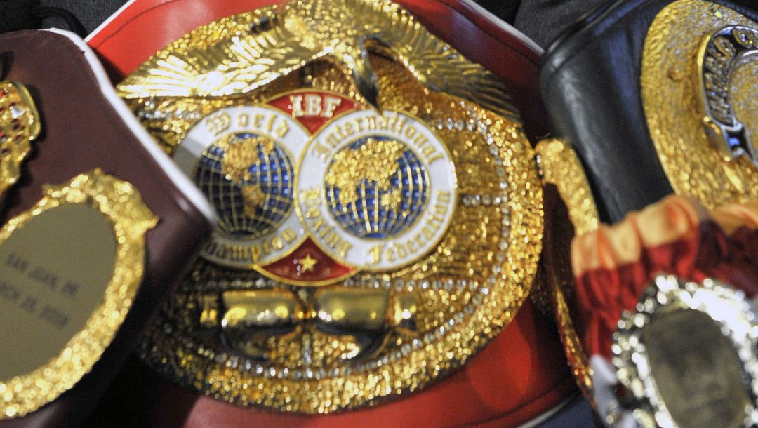 Ukrainian boxer Wladimir Klitschko, poses with his belts, during a press conference in London, Thursday, Oct. 21, 2010.