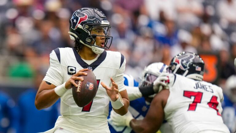 Houston Texans quarterback C.J. Stroud (7) throws against the Indianapolis Colts in the first half of an NFL football game in Houston, Sunday, Sept. 17, 2023.