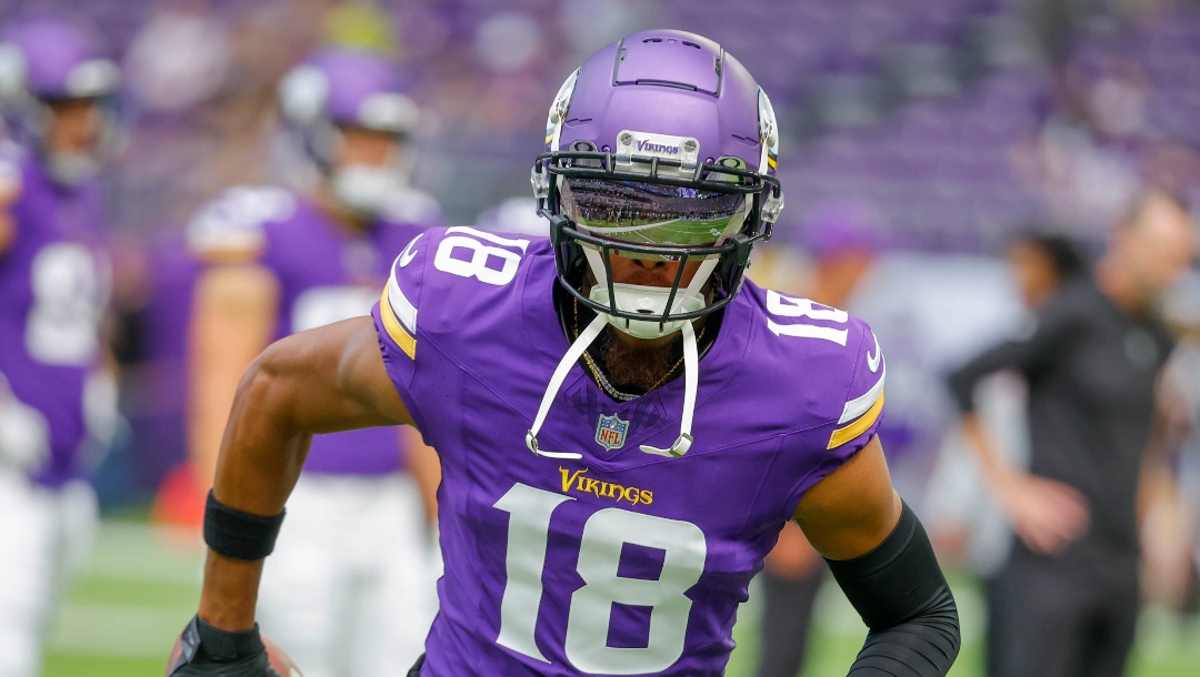 Minnesota Vikings wide receiver Justin Jefferson (18) warms up prior to an NFL preseason football game against the Arizona Cardinals, Saturday, Aug. 26, 2023, in Minneapolis. (AP Photo/Bruce Kluckhohn)