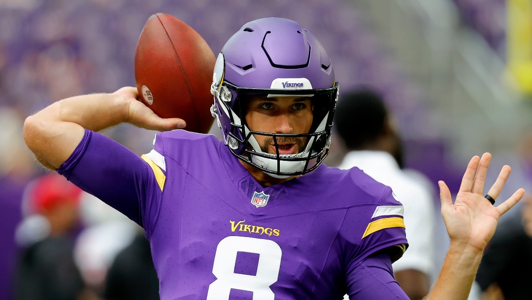 Minnesota Vikings quarterback Kirk Cousins warms up prior to an NFL preseason football game against the Arizona Cardinals, Saturday, Aug. 26, 2023, in Minneapolis. (AP Photo/Bruce Kluckhohn)
