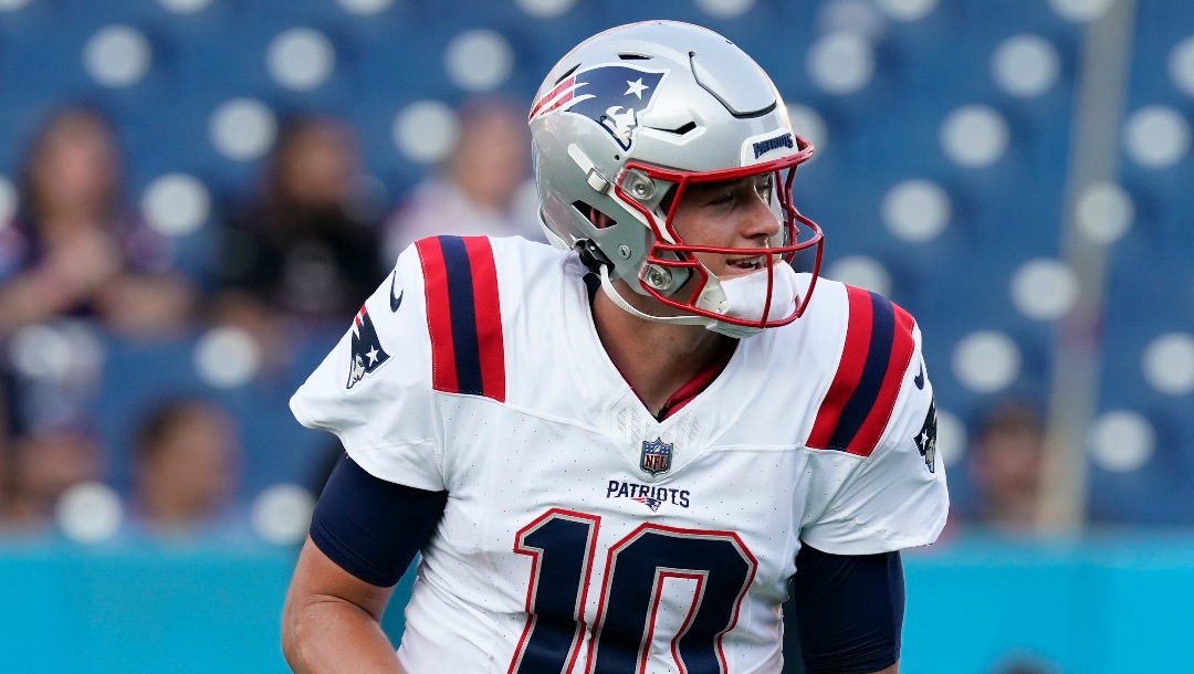 New England Patriots quarterback Mac Jones (10) warms up before an NFL preseason football game against the Tennessee Titans, Friday, Aug. 25, 2023, in Nashville, Tenn.