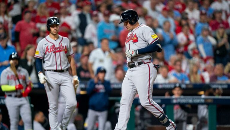Atlanta Braves' Austin Riley scores on his home rune during Game 4 of a baseball NL Division Series against the Philadelphia Phillies, Thursday, Oct. 12, 2023, in Philadelphia.