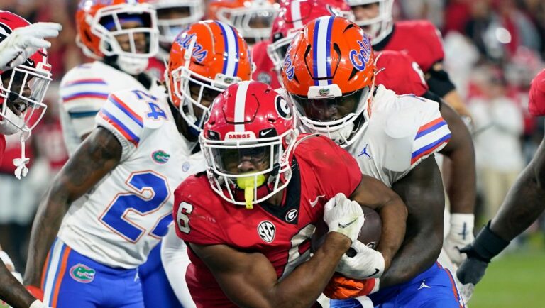 Georgia running back Kenny McIntosh (6) scores a touchdown against Florida during the second half of an NCAA college football game Saturday, Oct. 29, 2022, in Jacksonville, Fla.