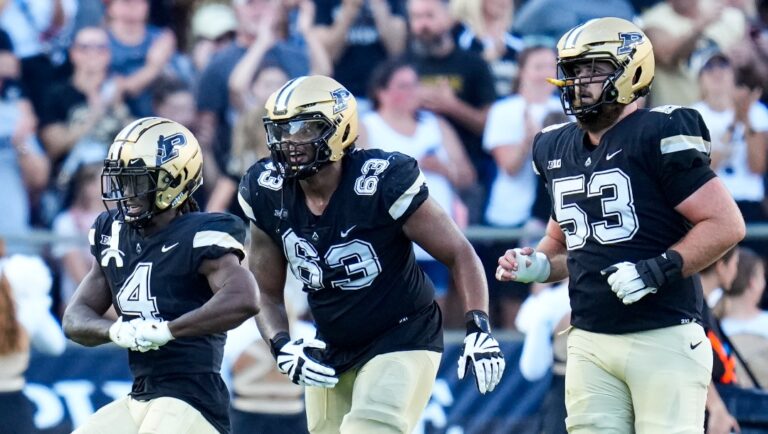 Purdue wide receiver Deion Burks (4) celebrates a touchdown against Illinois during the second half of an NCAA college football game in West Lafayette, Ind., Saturday, Sept. 30, 2023. (AP Photo/Michael Conroy)
