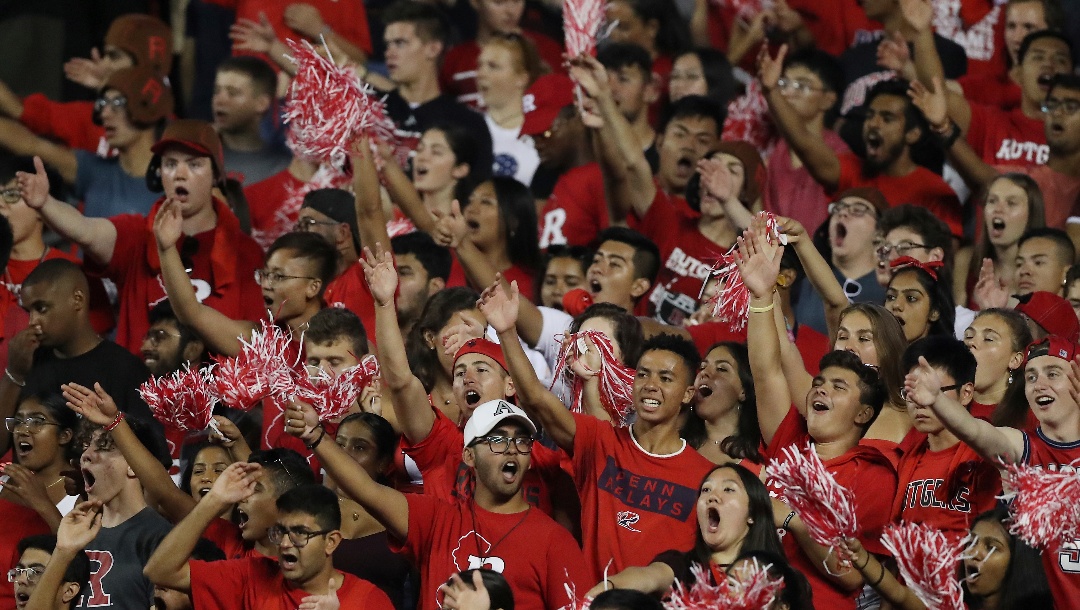 Rutgers Scarlet Knights fans cheer during an NCAA college football game against the Massachusetts Minutemen, Friday, Aug. 30, 2019, in Piscataway, N.J. Rutgers won 48-21. (AP Photo/Steve Luciano)