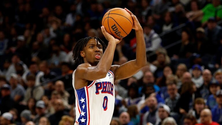MINNEAPOLIS, MINNESOTA - NOVEMBER 22: Tyrese Maxey #0 of the Philadelphia 76ers shoots the ball against the Minnesota Timberwolves in the third quarter at Target Center on November 22, 2023 in Minneapolis, Minnesota. The Timberwolves defeated the 76ers 112-99. NOTE TO USER: User expressly acknowledges and agrees that, by downloading and or using this photograph, User is consenting to the terms and conditions of the Getty Images License Agreement. (Photo by David Berding/Getty Images)