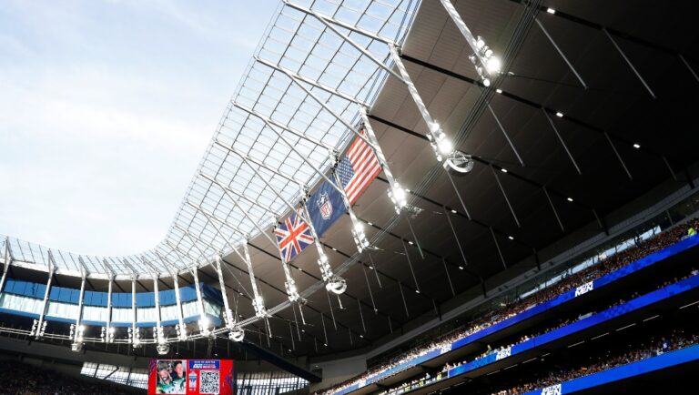 Fans cheer during an NFL football game between the Green Bay Packers and the New York Giants at Tottenham Hotspur Stadium in London, Sunday, Oct. 9, 2022. The New York Giants won 27-22. (AP Photo/Steve Luciano)
