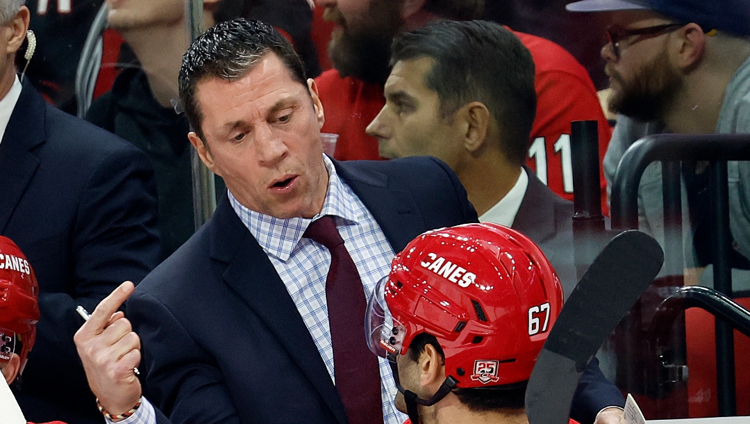 Carolina Hurricanes head coach Rod Brind'Amour talks with Max Pacioretty (67) during the second period of an NHL hockey game against the Nashville Predators in Raleigh, N.C., Thursday, Jan. 5, 2023. (AP Photo/Karl B DeBlaker)