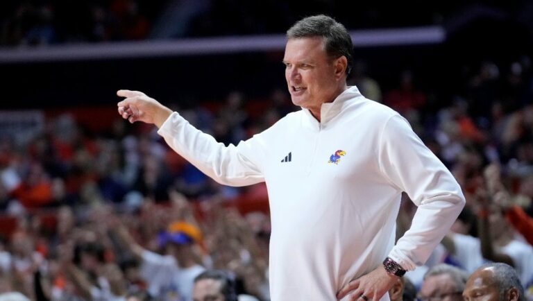 Kansas head coach Bill Self directs his team during the first half of the NCAA college basketball exhibition game against Illinois Sunday, Oct. 29, 2023, in Champaign, Ill.