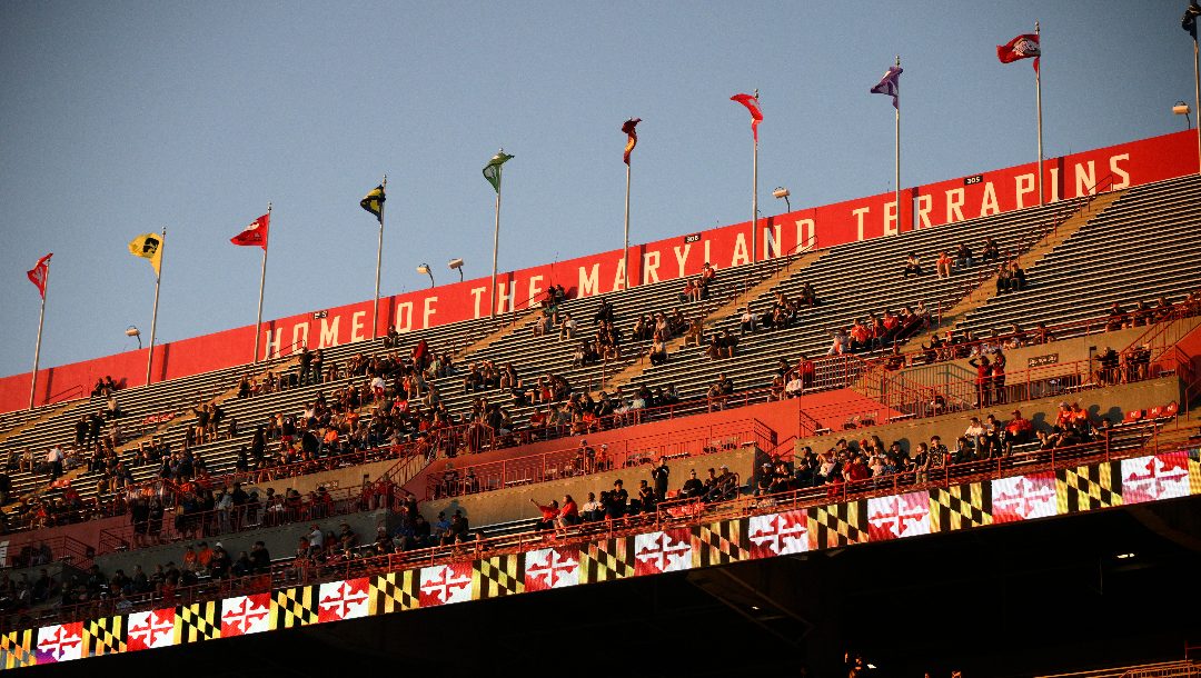 Spectators seen in the stands before an NCAA college football game between Maryland and Virginia, Friday, Sept. 15, 2023, in College Park, Md.