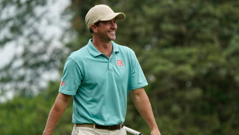 Adam Scott, of Australia, smiles after making a birdie putt on the first hole during the second round of the Wyndham Championship golf tournament in Greensboro, N.C., Friday, Aug. 4, 2023.