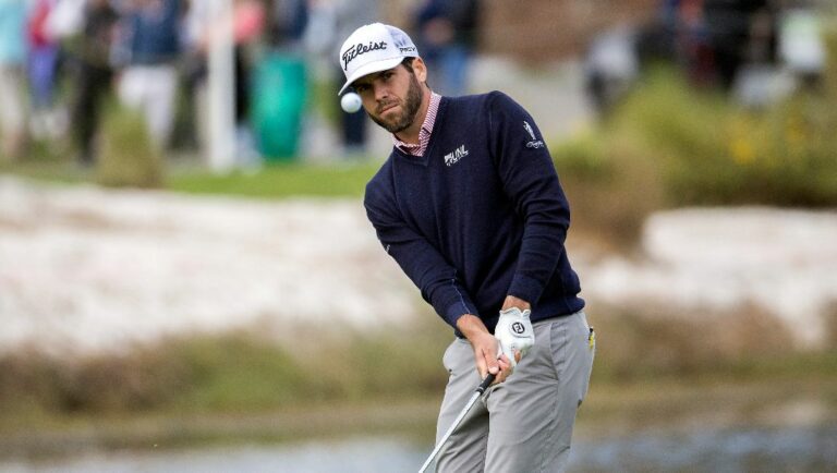 Ben Martin hits onto the 18th green during the third round of the RSM Classic golf tournament, Saturday, Nov. 19, 2022, in St. Simons Island, Ga.