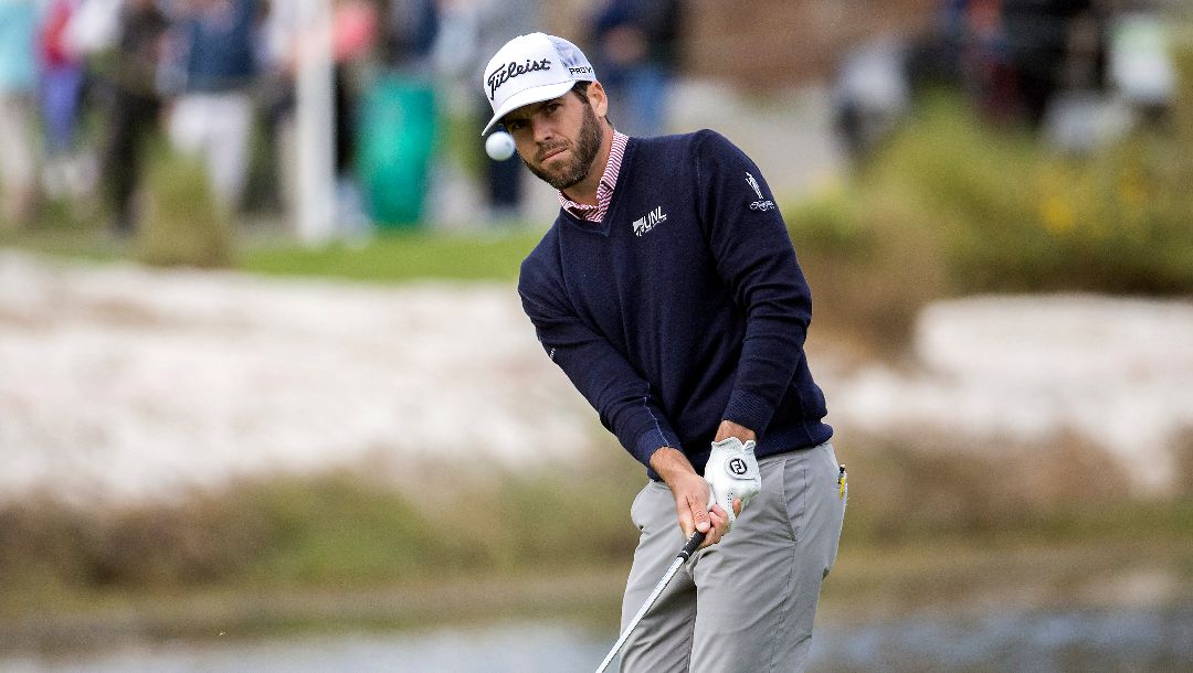 Ben Martin hits onto the 18th green during the third round of the RSM Classic golf tournament, Saturday, Nov. 19, 2022, in St. Simons Island, Ga.