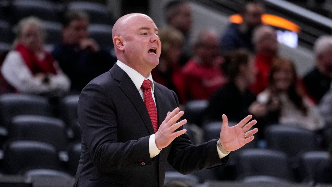 Ball State head coach Michael Lewis gestures in the first half of an NCAA college basketball game against Illinois State in Indianapolis, Saturday, Dec. 17, 2022.