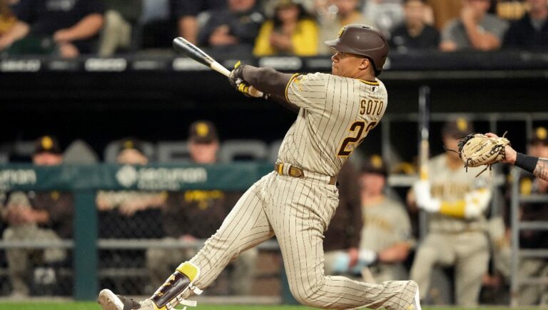 San Diego Padres' Juan Soto watches the flight of the ball during a baseball gameagainst the Chicago White Sox Friday, Sept. 29, 2023, in Chicago.