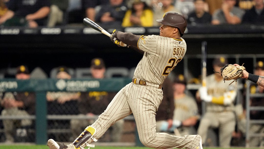San Diego Padres' Juan Soto watches the flight of the ball during a baseball gameagainst the Chicago White Sox Friday, Sept. 29, 2023, in Chicago.