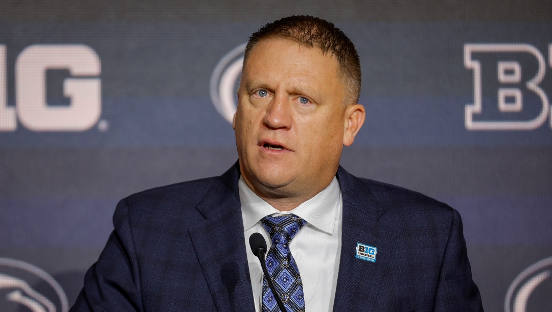 Penn State head coach Mike Rhoades speaks during Big Ten NCAA college basketball Media Days Tuesday, Oct. 10, 2023, in Minneapolis. (AP Photo/Bruce Kluckhohn)