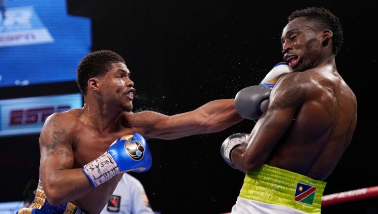 Shakur Stevenson hits Jeremiah Nakathila, of Namibia, in a WBO interim junior lightweight title fight Saturday, June 12, 2021.