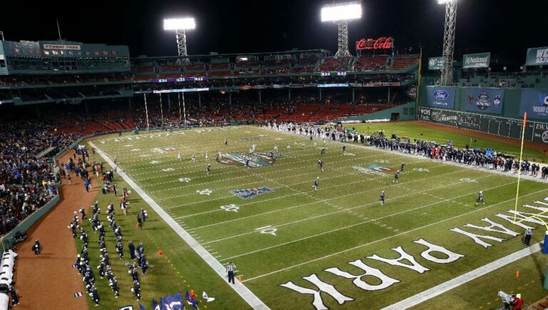 Boston College kicks off against Connecticut during the first quarter of an NCAA college football game at Fenway Park in Boston, Saturday, Nov. 18, 2017.