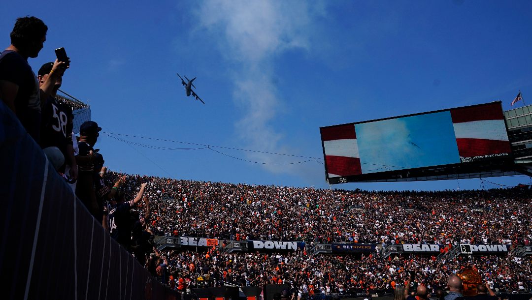 A plane fly over the Solider Field before an NFL football game between the Green Bay Packers and the Chicago Bears in Chicago, Sunday, Sept. 10, 2023.