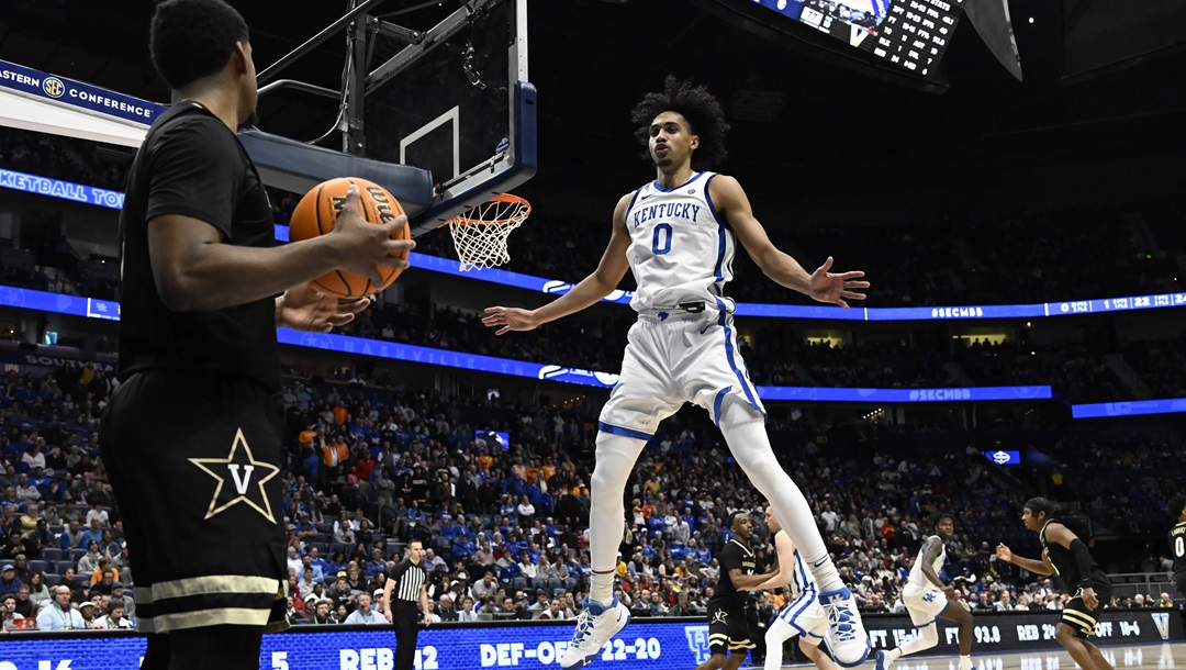 Kentucky forward Jacob Toppin (0) defends as Vanderbilt guard Jordan Wright looks to indound the ball during the second half of an NCAA college basketball game in the quarterfinals of the Southeastern Conference Tournament, Friday, March 10, 2023, in Nashville, Tenn.
