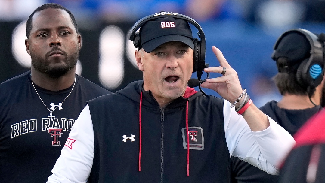 Texas Tech head coach Joey McGuire looks on during the first half of an NCAA college football game against BYU Saturday, Oct. 21, 2023, in Provo, Utah. (AP Photo/Rick Bowmer)