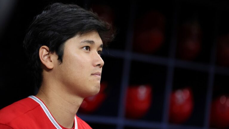 Los Angeles Angels' Shohei Ohtani looks on during pregame ceremonies prior to a baseball game against the Tampa Bay Rays Wednesday, Aug. 24, 2022, in St. Petersburg, Fla. (AP Photo/Mike Carlson)
