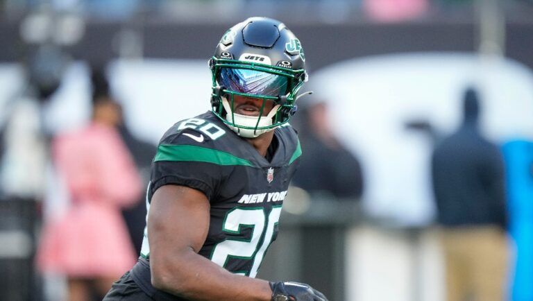 New York Jets running back Breece Hall (20) warms up before an NFL football game against the Miami Dolphins, Friday, Nov. 24, 2023, in East Rutherford, N.J. (AP Photo/Bryan Woolston)