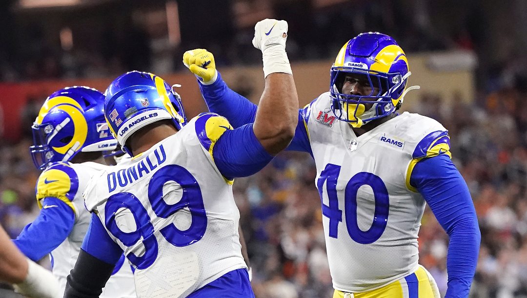 Los Angeles Rams defensive lineman Aaron Donald (99) and linebacker Von Miller celebrate a sack of Cincinnati Bengals quarterback Joe Burrow in Super Bowl 56, Sunday, Feb. 13, 2022 in Inglewood, Calif.