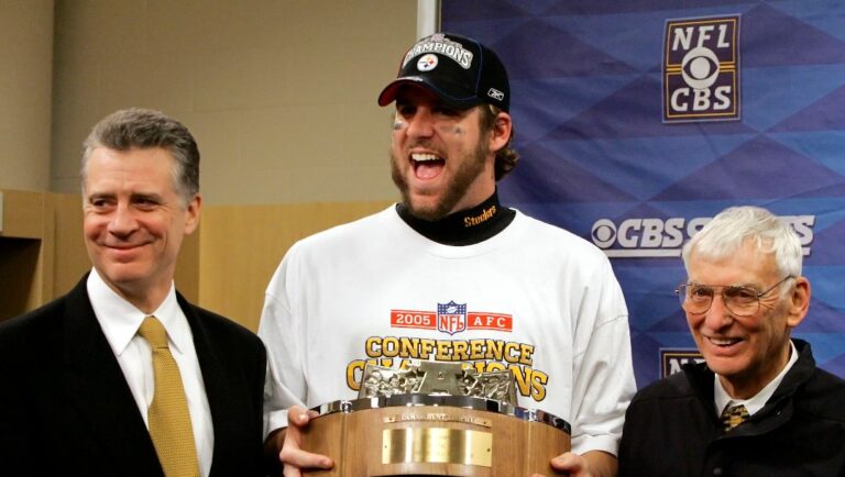 Pittsburgh Steelers quarterback Ben Roethlisberger, center, holds the AFC Championship trophy with Steelers president Art Rooney III, left, and Chairman Dan Rooney after Pittsburgh advanced to Super Bowl XL with a 34-17 win over the Denver Broncos Sunday, Jan. 22, 2006, in Denver.