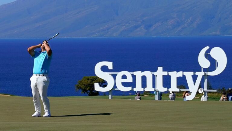 Tom Kim reacts after missing his birdie putt on the 10th green during the final round of the Tournament of Champions golf event, Sunday, Jan. 8, 2023, at Kapalua Plantation Course in Kapalua, Hawaii.