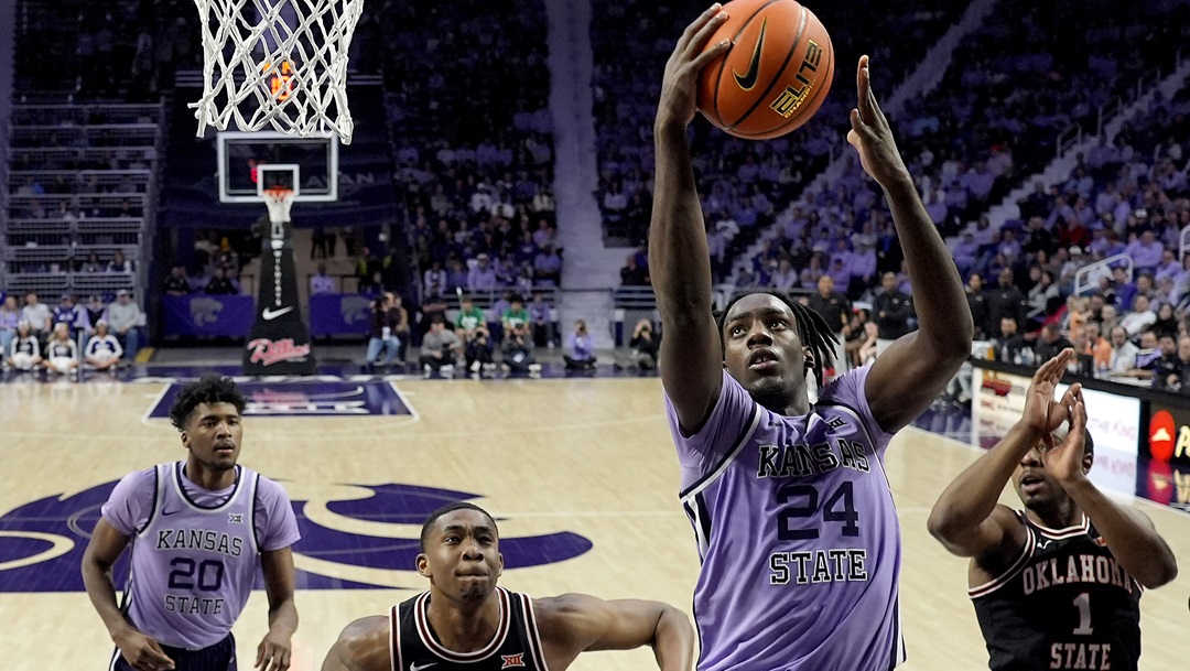 Kansas State forward Arthur Kaluma (24) puts up a shot during the second half of an NCAA college basketball game against Oklahoma State Saturday, Jan. 20, 2024, in Manhattan, Kan. Kansas State won 70-66.