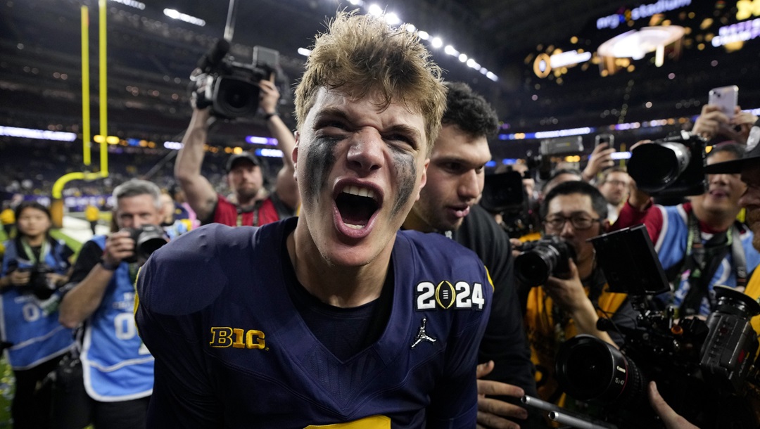 Michigan quarterback J.J. McCarthy celebrates their win against Washington in the national championship NCAA College Football Playoff game Monday, Jan. 8, 2024, in Houston.