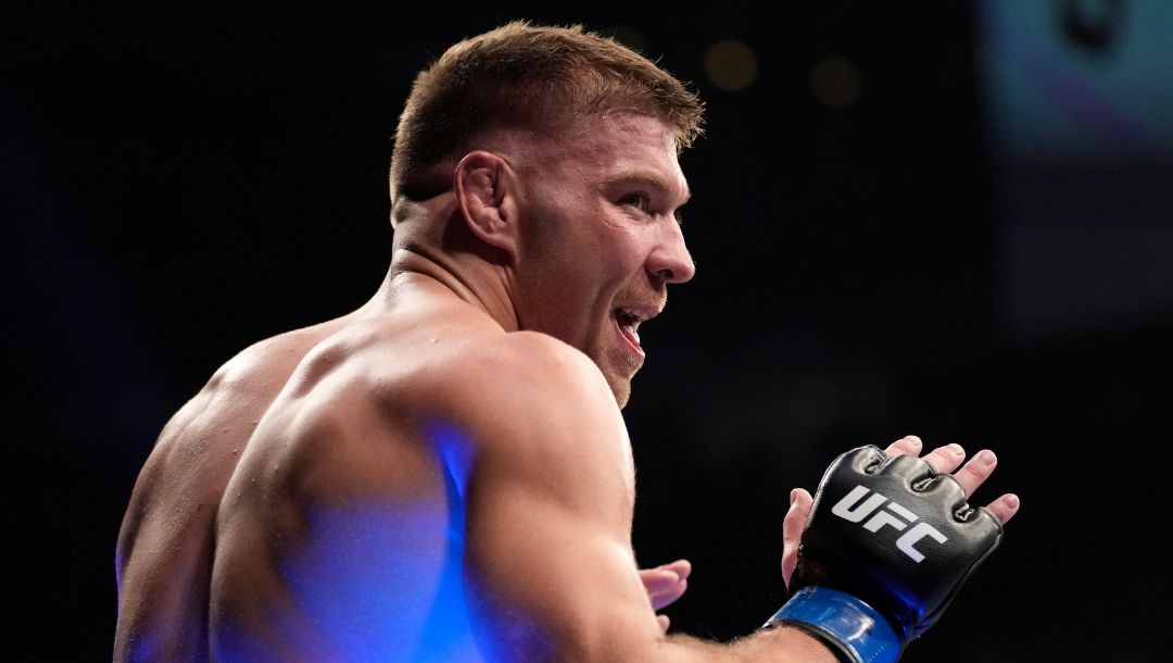 Dricus Du Plessis celebrates after defeating Darren Till during a UFC 282 mixed martial arts middleweight bout.