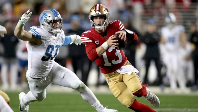 San Francisco 49ers quarterback Brock Purdy (13) runs during the NFC Championship NFL football game against the Detroit Lions in Santa Clara, Calif., Sunday, Jan. 28, 2024.