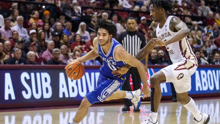 Duke guard Jared McCain (0) drives around Florida State forward Jamir Watkins (2) during the second half of an NCAA college basketball game, Saturday, Feb. 17, 2024, in Tallahassee, Fla.