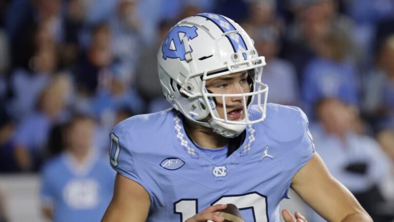 North Carolina quarterback Drake Maye (10) looks to pass during the first half an NCAA college football game against Virginia, Saturday, Oct. 21, 2023, in Chapel Hill, N.C. (AP Photo/Chris Seward)