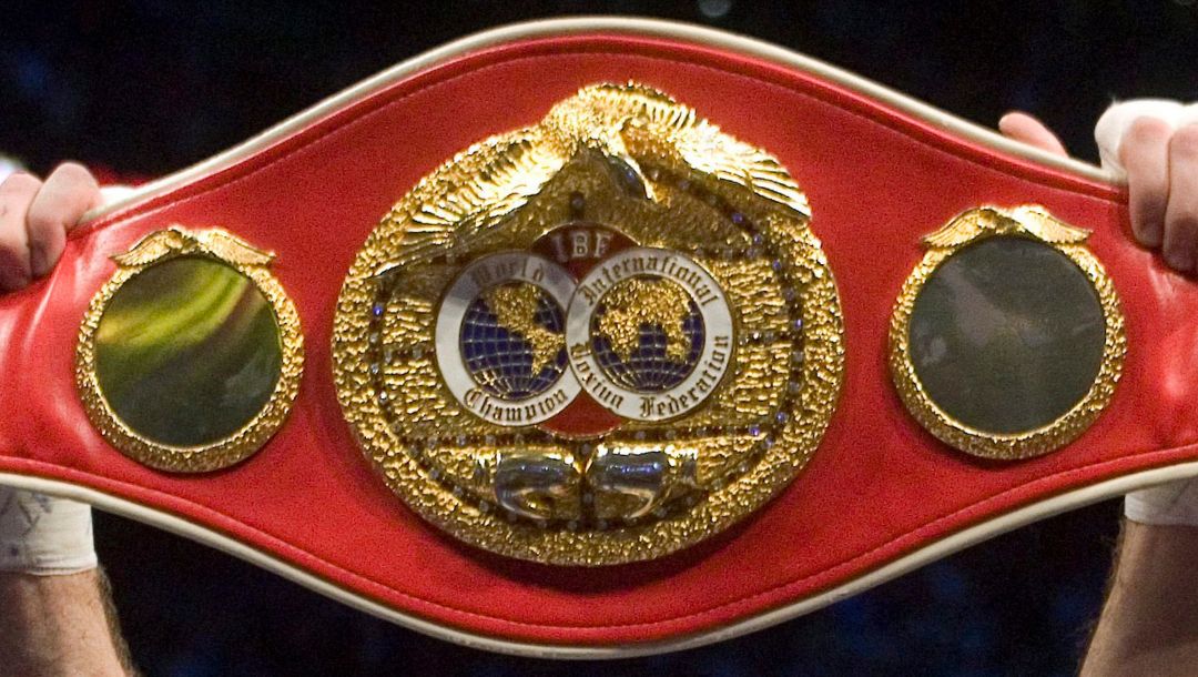 Lucian Bute, from Montreal, holds up the championship belt after defeating Alejandro Berrio, of Colombia.