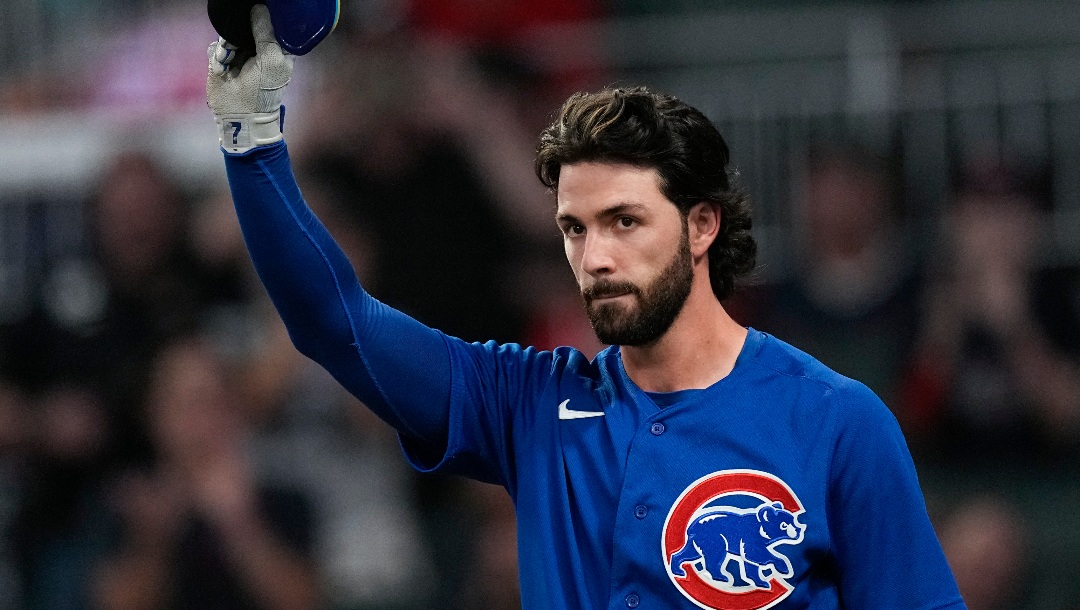 Chicago Cubs' Dansby Swanson waves to the crowd before batting against his former team the Atlanta Braves in the second inning of a baseball game, Tuesday, Sept. 26, 2023, in Atlanta.