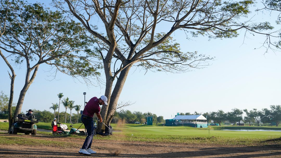 Troy Merritt, of the United States, hits from the sand on the first hole during the final round of the Mexico Open golf tournament in Puerto Vallarta, Mexico, Sunday, Feb. 25, 2024.