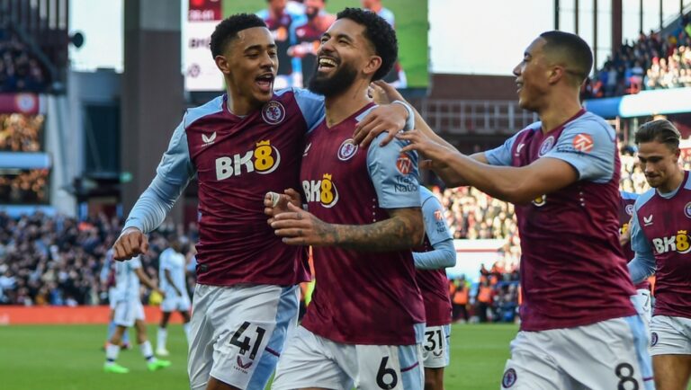 Aston Villa's Douglas Luiz, centre, celebrates after scoring his side's second goal during the English Premier League soccer match between Aston Villa and Nottingham Forest at the Villa Park stadium in Birmingham, England, Saturday, Feb. 24, 2024.