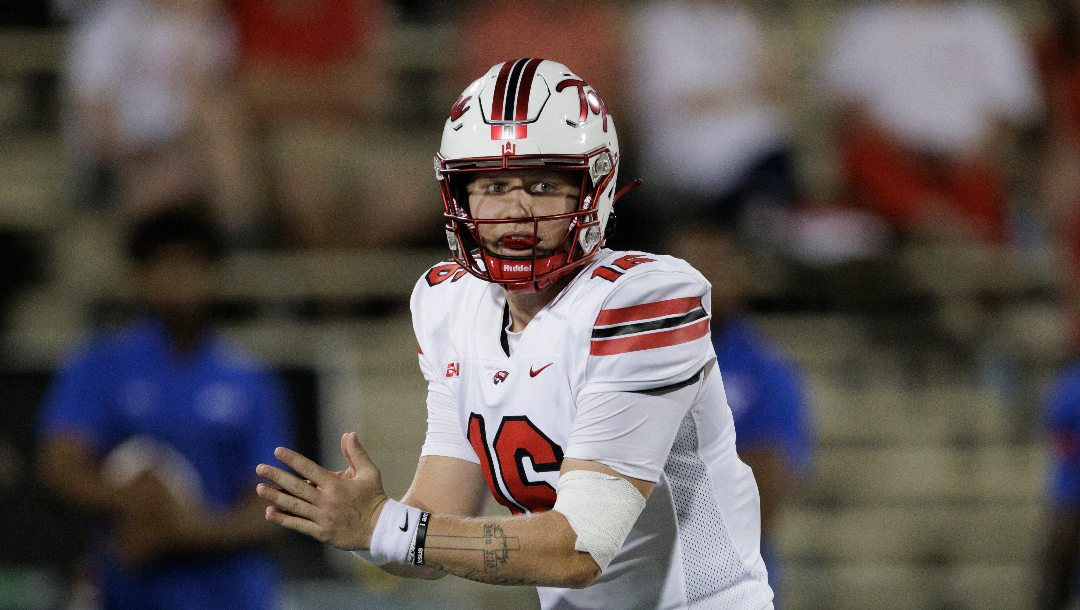 Western Kentucky quarterback Austin Reed (16) gets ready to receive the snap during an NCAA football game between Western Kentucky University and Houston Christian University on Saturday, Sept. 9, 2023, in Bowling Green, Ky. WKU beat HCU 52-22.