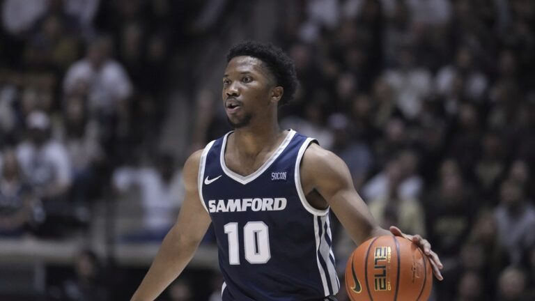 Samford guard Garrett Hicks (10) plays against Purdue during the first half of an NCAA college basketball game in West Lafayette, Ind., Monday, Nov. 6, 2023.