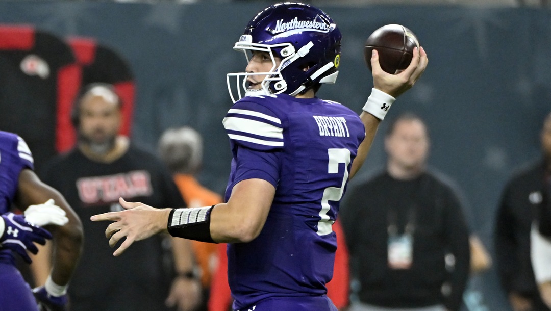 Northwestern quarterback Ben Bryant (2) looks to pass against Utah during the second half of the Las Vegas Bowl NCAA college football game, Saturday, Dec. 23, 2023, in Las Vegas.