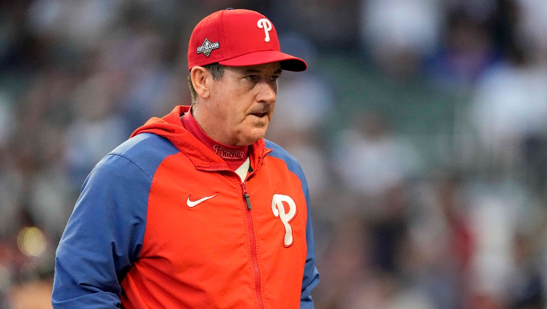 FILE - Philadelphia Phillies Manager Rob Thomson walks to the mound during the fourth inning of Game 1 of a baseball NL Division Series against Atlanta Braves, Oct. 7, 2023, in Atlanta. The Phillies announced Monday, Dec. 4, 2023, that they have extended Thomson's contract through the 2025 season after he led the team to two straight trips to the NL Championship Series. (AP Photo/John Bazemore, File)