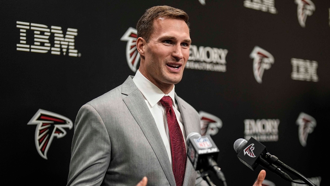 Atlanta Falcons quarterback Kirk Cousins speaks during a news conference Wednesday, March 13, 2024, in Flowery Branch, Ga. Cousins has one playoff victory in his long career. The Falcons are betting at least $100 million that he's the guy who can lead them to the first Super Bowl title in franchise history. (AP Photo/Mike Stewart)
