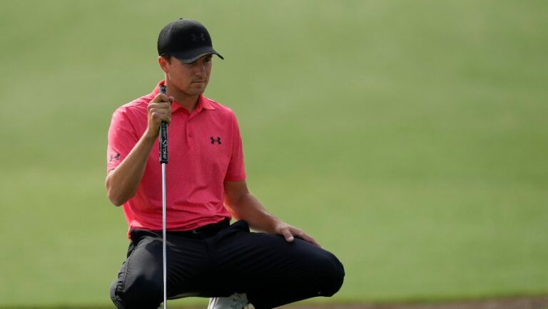 Jordan Spieth lines up a putt on the second hole during the first round at the Masters golf tournament at Augusta National Golf Club Thursday, April 11, 2024, in Augusta, Ga.