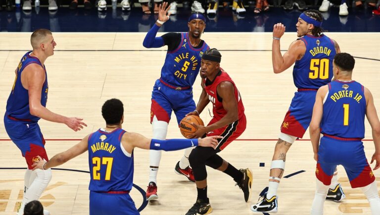 Jimmy Butler #22 of the Miami Heat drives to the basket during the first quarter against the Denver Nuggets in Game One of the 2023 NBA Finals at Ball Arena on June 01, 2023 in Denver, Colorado.